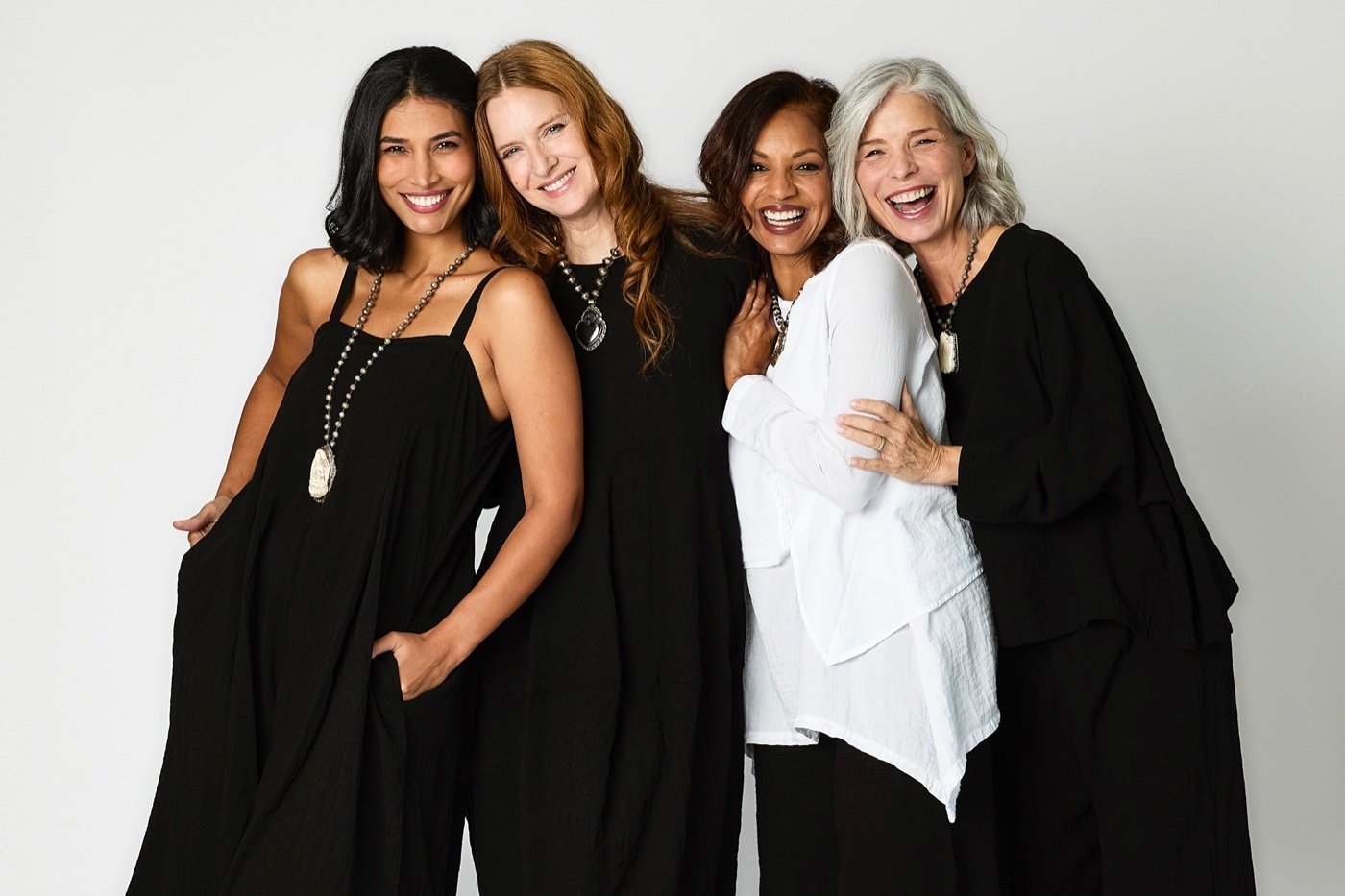 READY TRADING models wearing black and white clothing